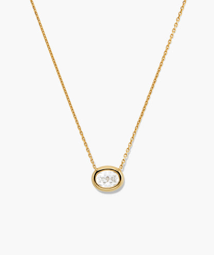Colar dourado com pingente oval de cristal
